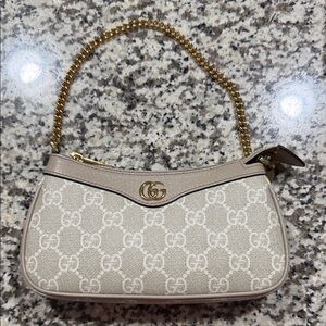 Gucci Beige Monogram Clutch with Gold Chain